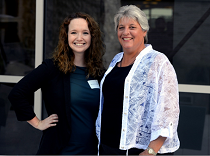 DaCotah Ledbetter and Amy Miller standing together outdoors.
