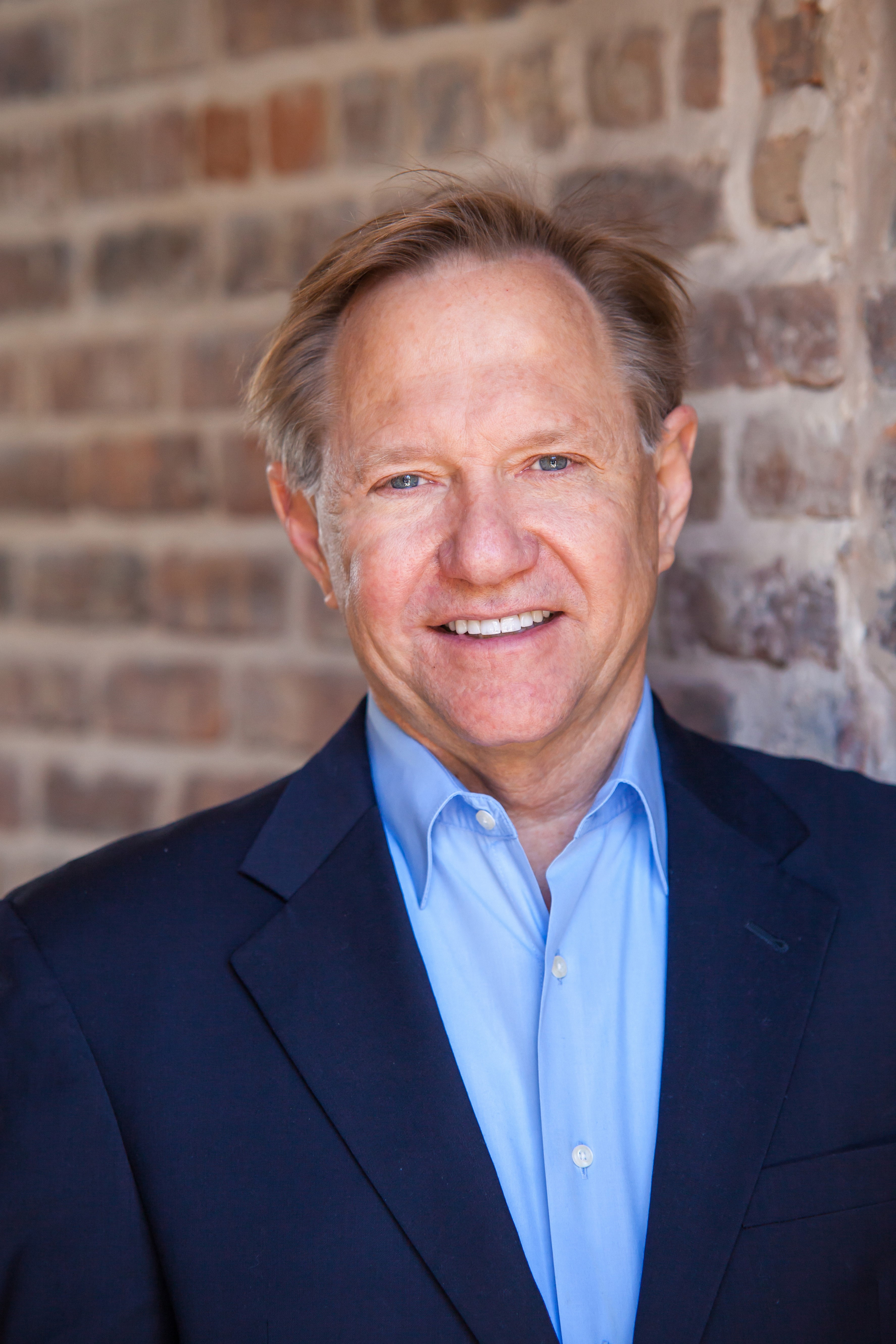 Professional headshot of Quint Studer.