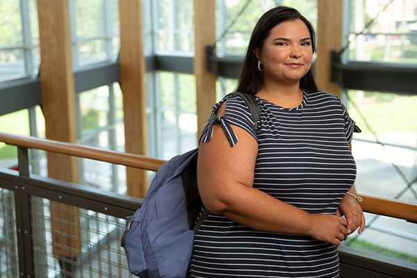 Student smiling at camera