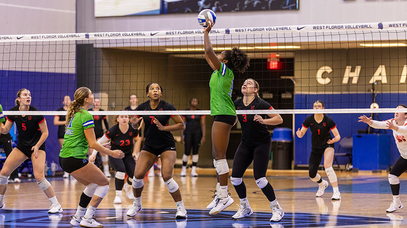 Argos Women's Volleyball playing a match in the fieldhouse