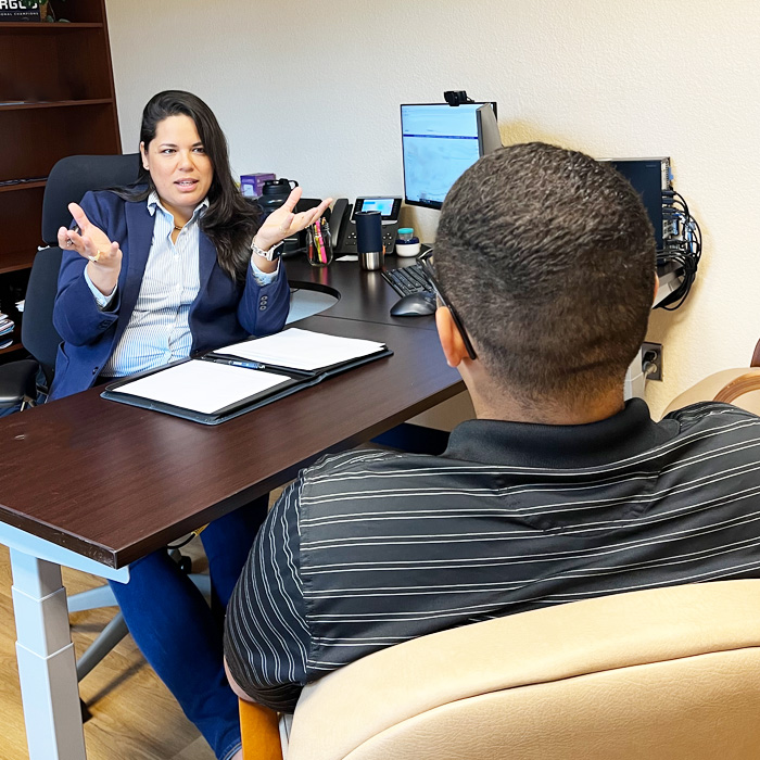 The Student Ombuds talking to a student in their office