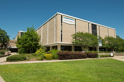 Image of the John C. Pace Library Building from Cannon Green