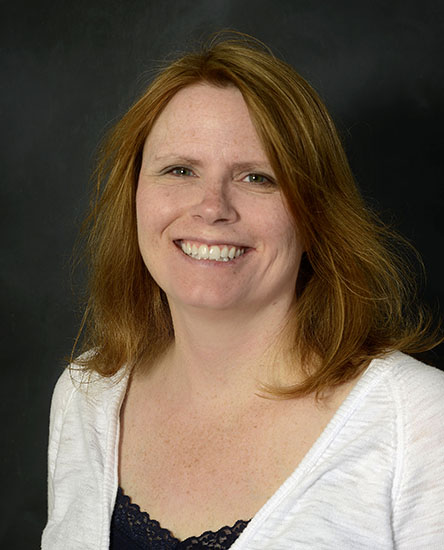 Katie Cavnar indoor headshot.