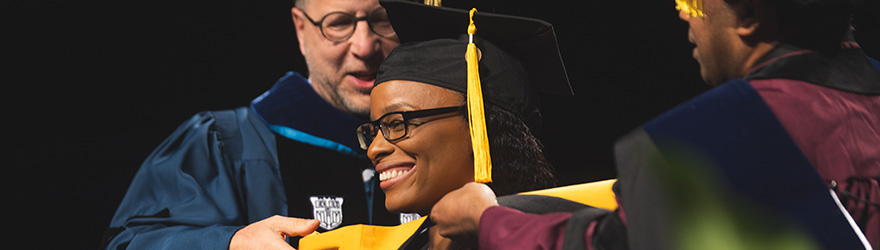 A UWF graduate received an academic hood at commencement.