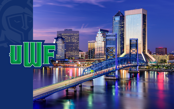 Jacksonville skyline at dusk with a lit bridge spanning the St. Johns River and a UWF logo on the left.