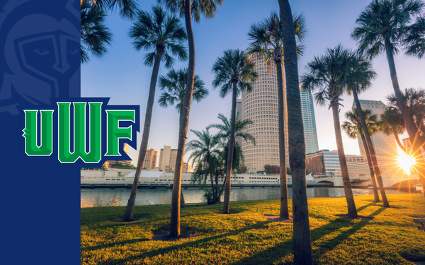 UWF graphic featuring the Tampa waterfront and downtown skyline framed by palm trees at sunset.