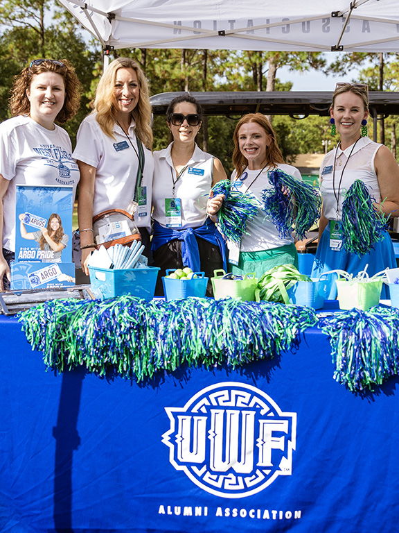 UWF alumni staff at football tailgate