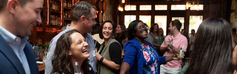 alumni enjoy a happy hour at Old Hickory Whiskey Bar