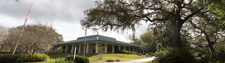 A wide angle shot of building 12 on the Pensacola Main Campus