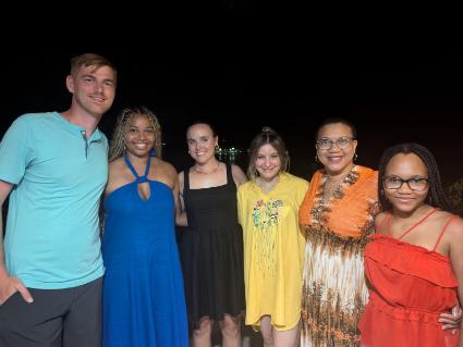 A group of alumni and guests pose for a photo in Costa Rica