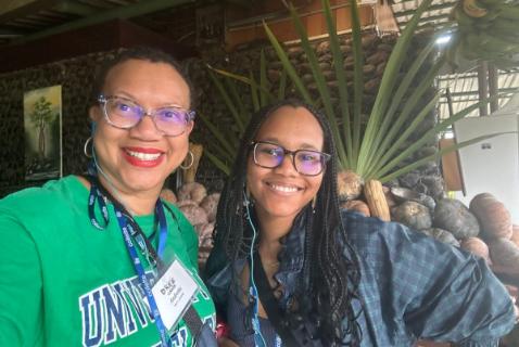 A mom and daughter pose for a close up photo in Costa Rica