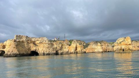 A stunning view of the cliffs of Portugal taken from a boat.