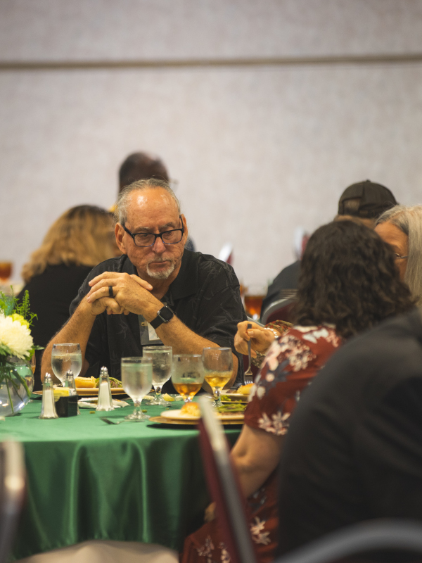 Golden Graduates and guests enjoy a seated lunch after the ceremony.