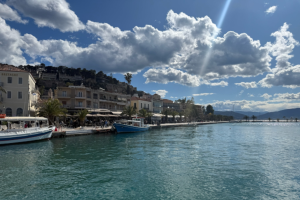 A sunny, scenic view along the Mediterranean Sea at the Greek city of Nafplio.