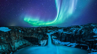 The northern lights in blue green and purple hues