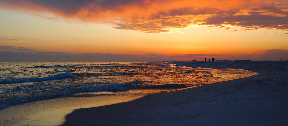 A striking sunset along the beach at Gulf Islands National Seashore