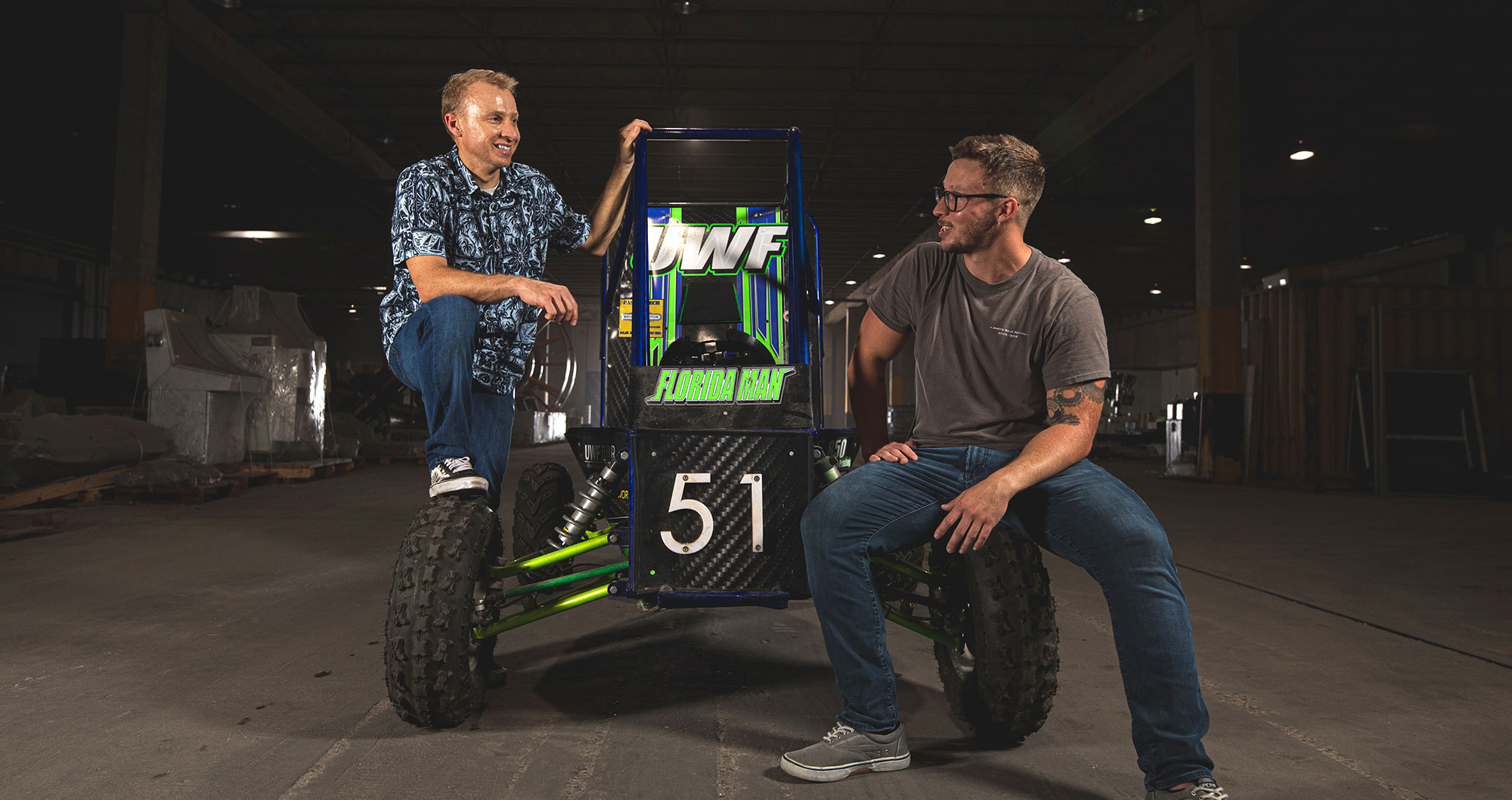 The man, the myth, the legend. Steven and his mentor, Dr. Joseph Piacenza with the off-road vehicle they built together with the UWF SAE Baja team.