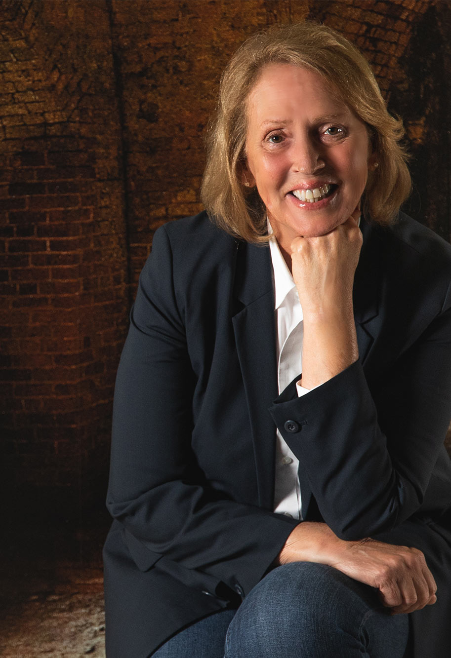 Suzanne Lewis in a brick fort