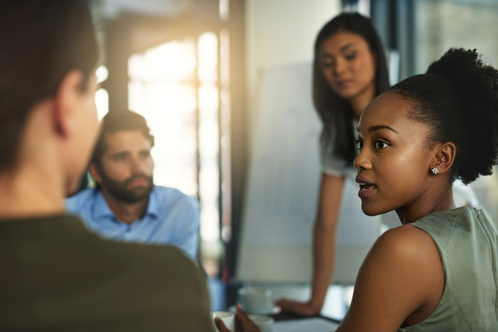 Group of business men and women in a meeting