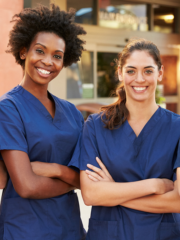Portrait of a medial team outside medical office