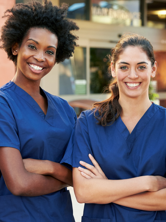 Portrait of a medial team outside medical office