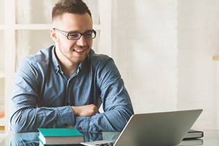 Student sitting at laptop