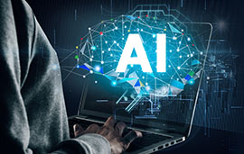 Person on laptop with large AI in digital bubble above it
