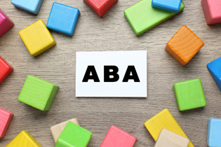 Building blocks with a sign that says ABA