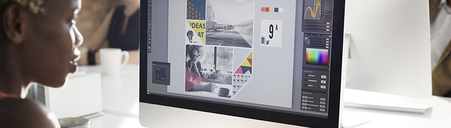 Graphic designer working at desk