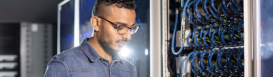 Portrait of an IT professional in server room