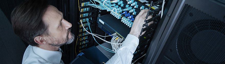 Portrait of an IT professional in server room