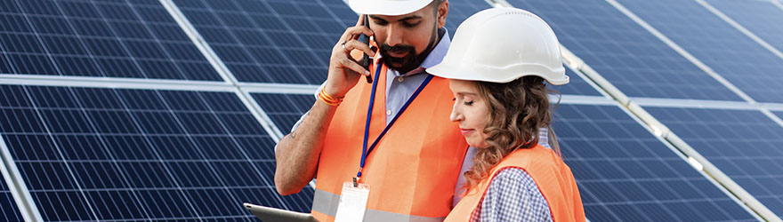 Solar technology workers in solar field