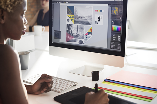 Graphic designer at computer