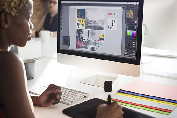 Graphic designer at computer