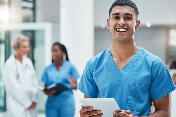 Medical Billing medical office employee smiling at the camera