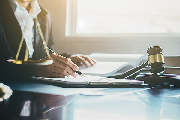 legal assistant working on contract