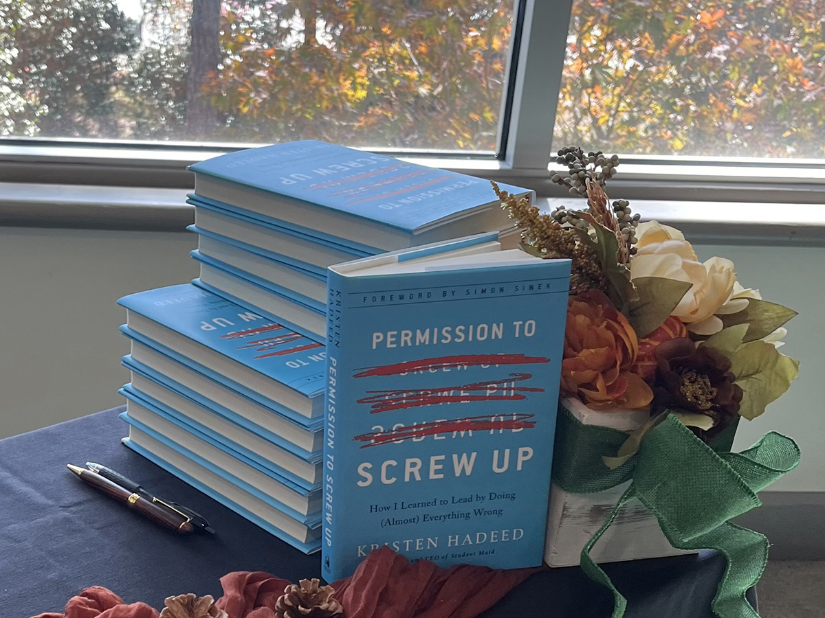 Stack of 2023 UWF Employee Relations Symposium speaker Kristen Hadeed's authored Permission To Screw Up book