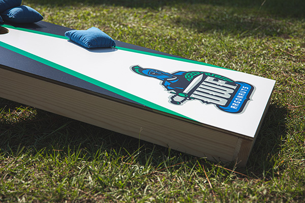 UWF branded corn hole board.