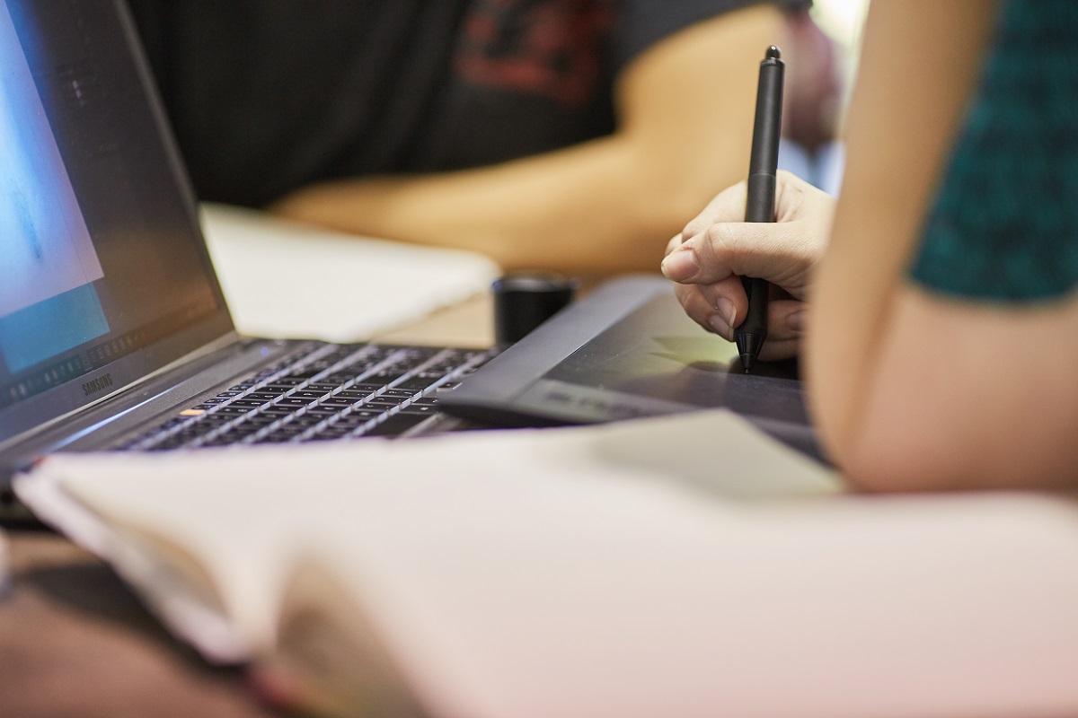 A photo of a person writing