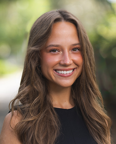 Emma Auerbach outdoor headshot.