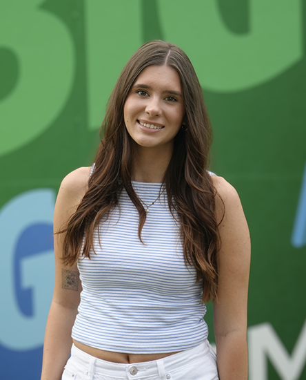 Chloe Wolfenden outdoor headshot.