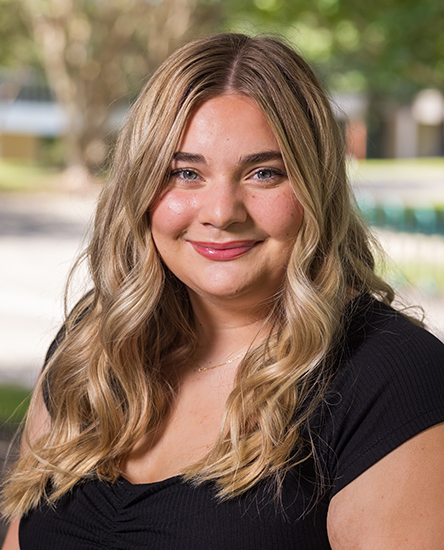 Chrissy Potter outdoor headshot.