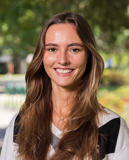 Melody Burke outdoor headshot.