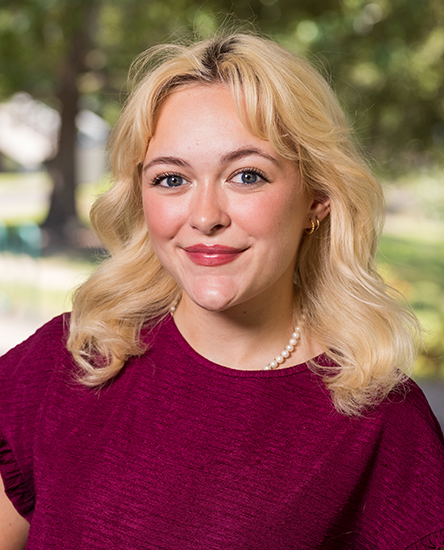 Nadia Palag outdoor headshot.