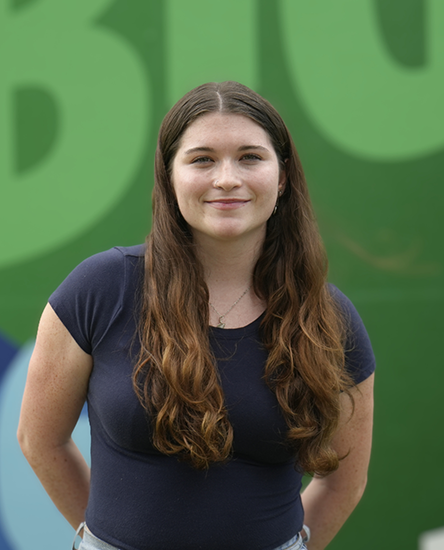 Riley Richards outdoor headshot.