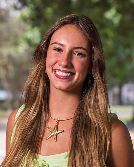 Taylor Parry outdoor headshot.