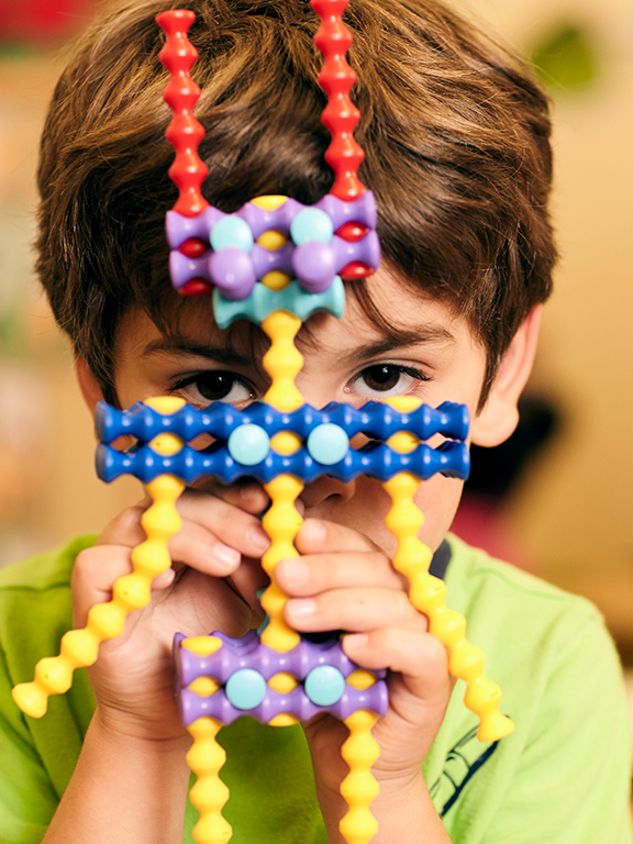 Child playing with toys
