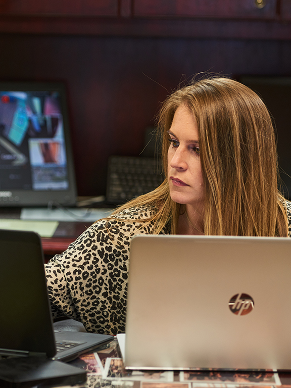 Criminal Justice intern working at their desk