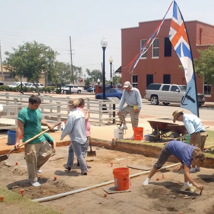 archaeologists conducting field research