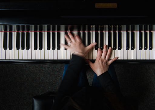 Dr. Patricia Izbicki plays the piano